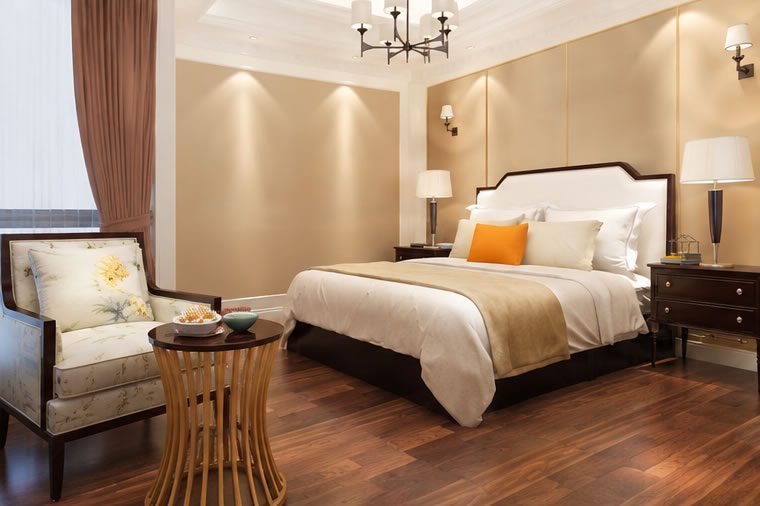 Comfortable furnished bedroom at The Sterling Suite